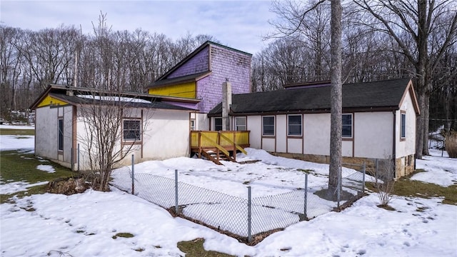 view of snow covered exterior