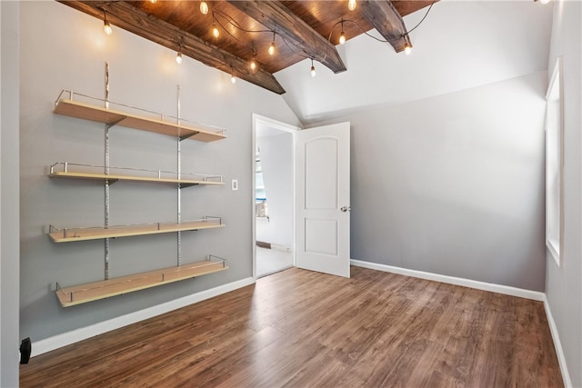 interior space with hardwood / wood-style floors, vaulted ceiling with beams, and wood ceiling