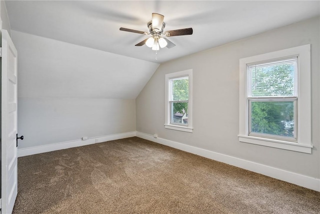 bonus room featuring carpet flooring, ceiling fan, and vaulted ceiling