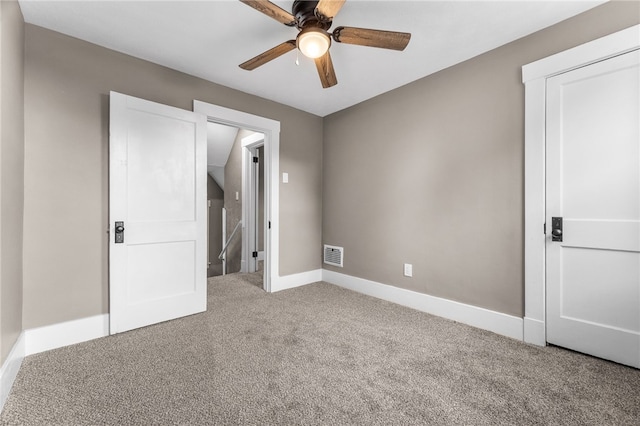 unfurnished bedroom with carpet and ceiling fan