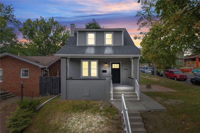 bungalow-style home with a porch