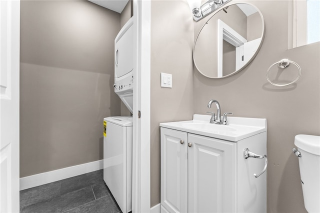 bathroom featuring vanity, toilet, and tile patterned floors