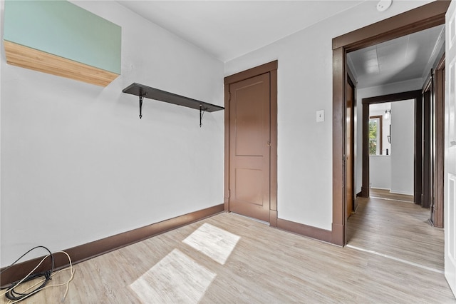 corridor featuring light hardwood / wood-style floors