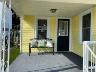 property entrance with a porch