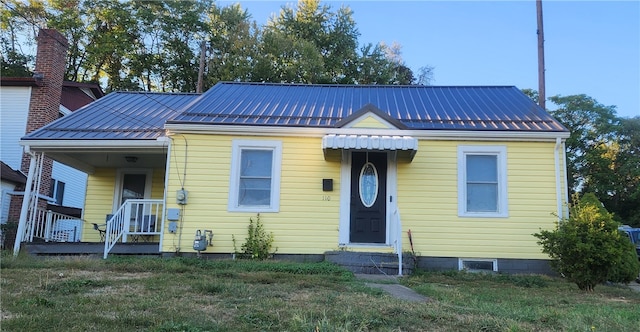 bungalow with a front lawn