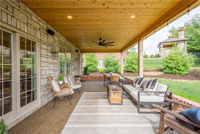 view of patio / terrace with ceiling fan and outdoor lounge area