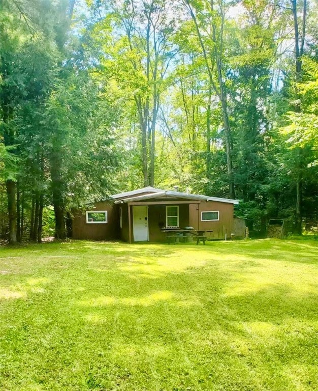 exterior space featuring a front lawn