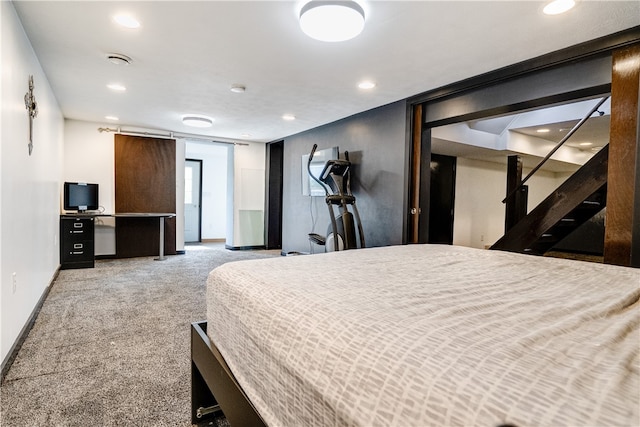 bedroom featuring light colored carpet