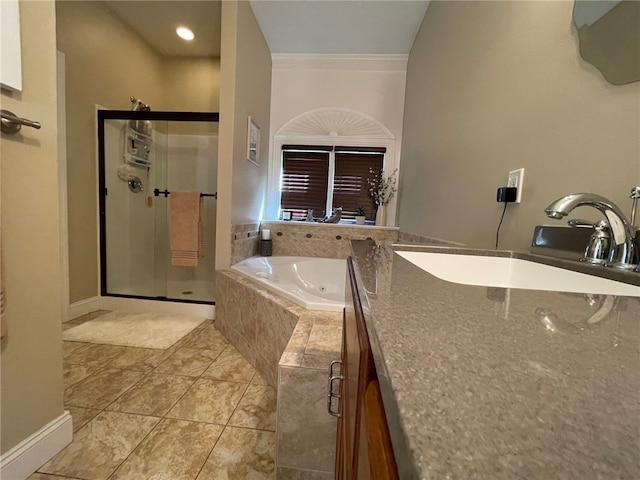 bathroom with crown molding, tile patterned flooring, sink, and separate shower and tub