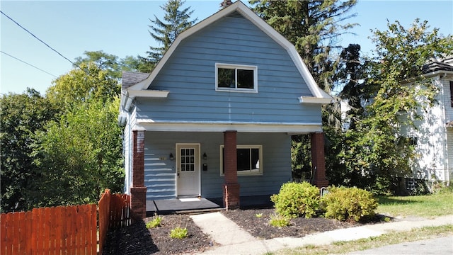 bungalow-style house featuring covered porch