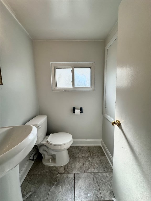 bathroom featuring toilet