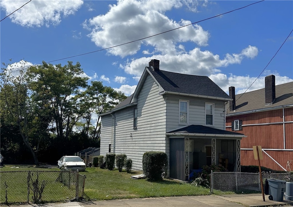 view of property exterior featuring a lawn