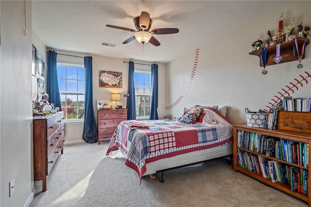 carpeted bedroom featuring ceiling fan