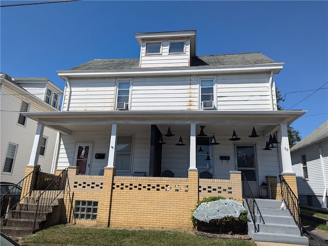 view of front of home featuring covered porch