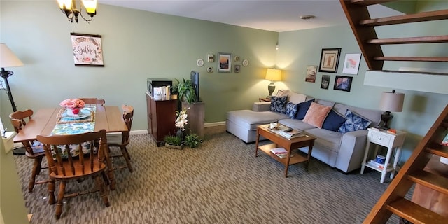 living room with a chandelier and carpet flooring