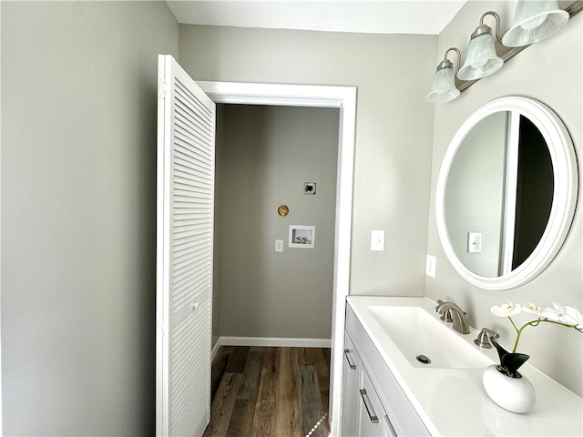 bathroom featuring vanity and wood-type flooring