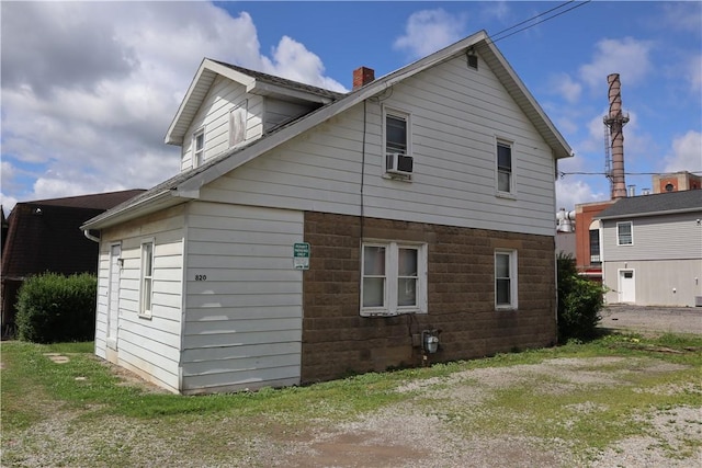 820-822 Grant St, Indiana Boro, PA 15701 - rear view of house with a chimney