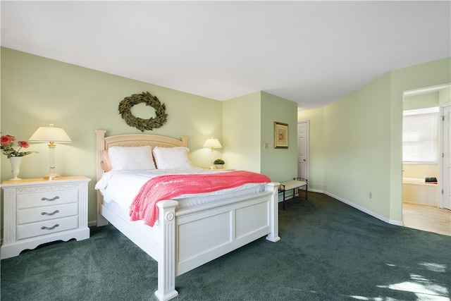 carpeted bedroom with ensuite bathroom