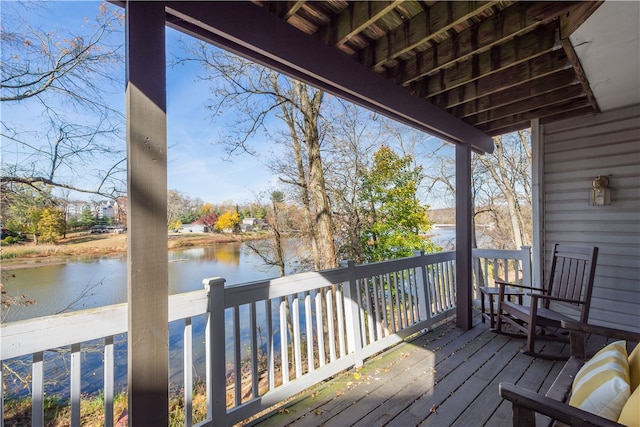 deck featuring a water view