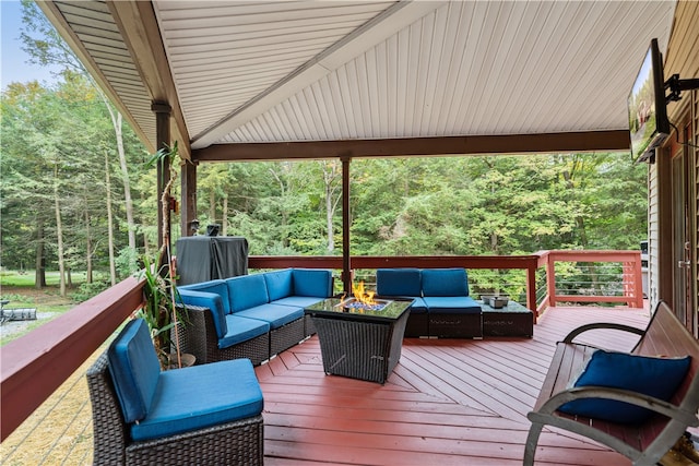 wooden terrace with outdoor lounge area