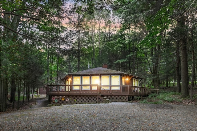 view of front of home with a deck