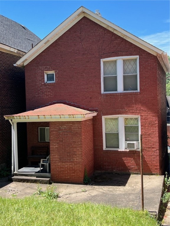 back of property featuring a patio area