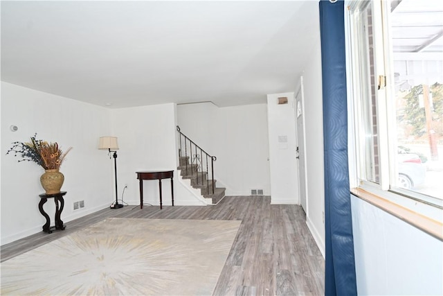 foyer entrance with light hardwood / wood-style flooring