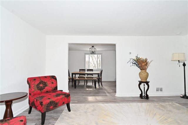 living area featuring hardwood / wood-style floors