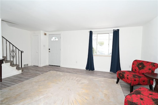 entrance foyer with hardwood / wood-style floors