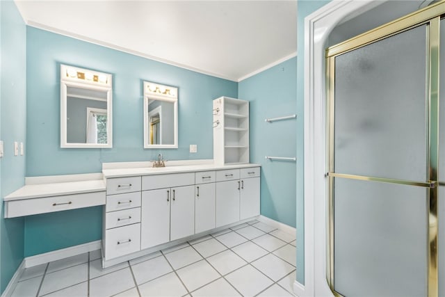 bathroom with walk in shower, vanity, tile patterned floors, and ornamental molding