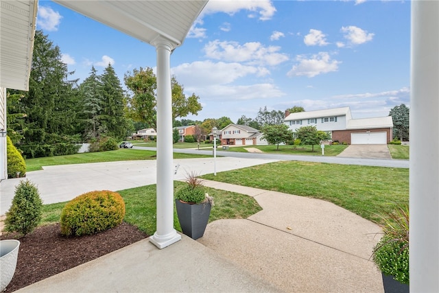 view of yard featuring a garage