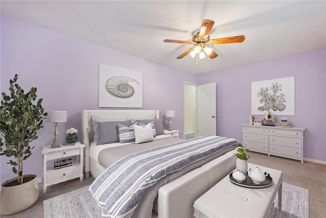 bedroom featuring ceiling fan and carpet flooring