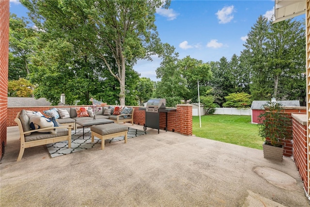 view of patio with a grill and an outdoor living space