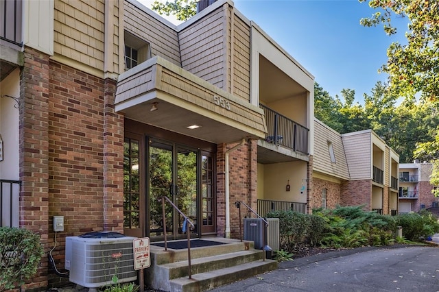 view of property with cooling unit