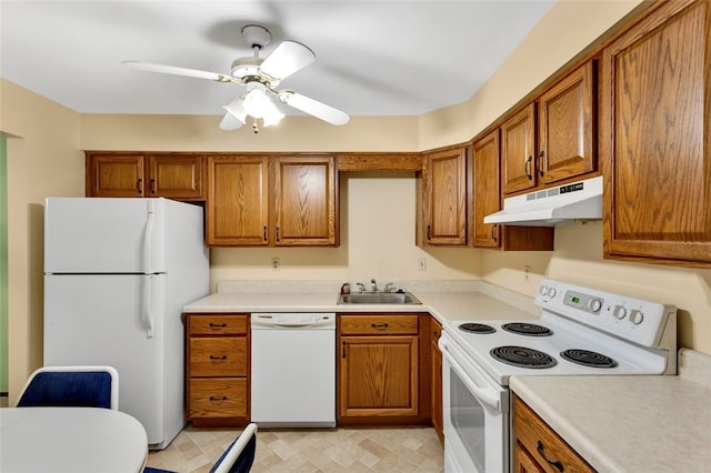 kitchen with ceiling fan, sink, and white appliances