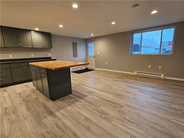 101 Main, St, PA 16050 - kitchen with a kitchen island, baseboard heating, plenty of natural light, light wood-type flooring, and wood counters