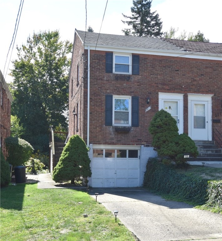 view of front of property featuring a garage