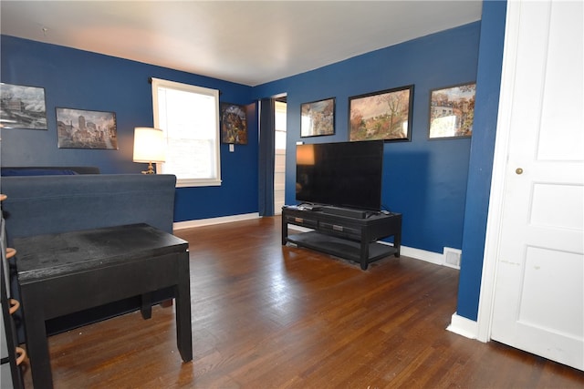 bedroom featuring dark wood-type flooring