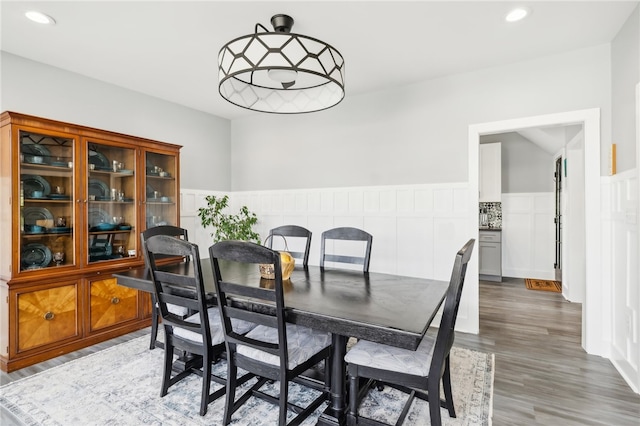 dining area with wood-type flooring