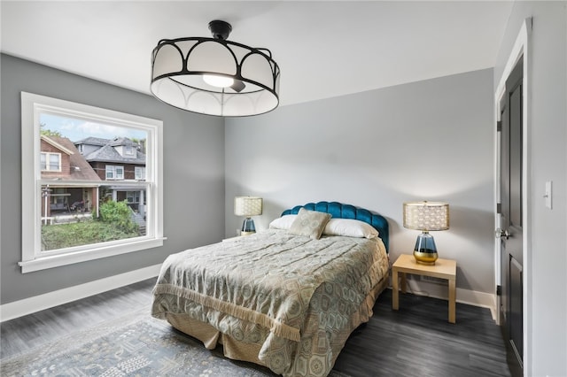 bedroom featuring dark hardwood / wood-style flooring