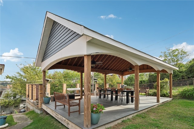 surrounding community featuring a deck, a gazebo, a lawn, and a patio