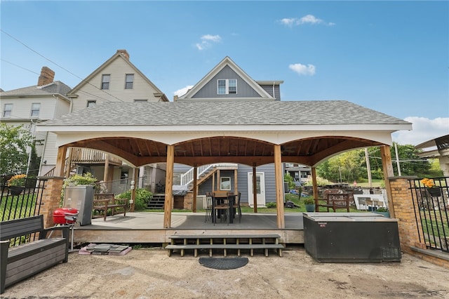 view of property's community featuring a gazebo and a deck