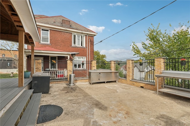 back of property featuring a patio