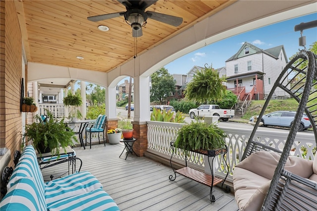 wooden terrace with ceiling fan