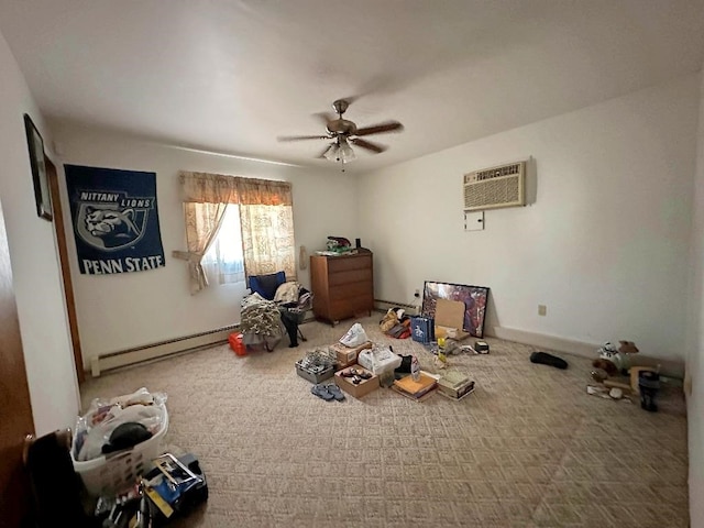 misc room with a baseboard radiator, ceiling fan, carpet floors, and a wall mounted AC