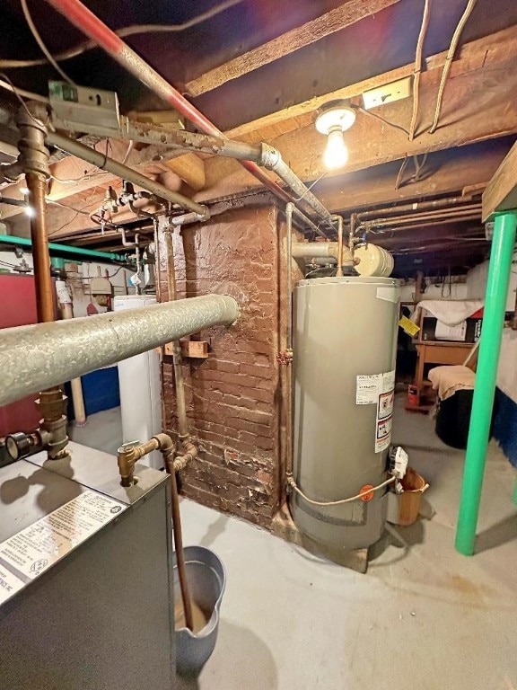 utility room featuring gas water heater