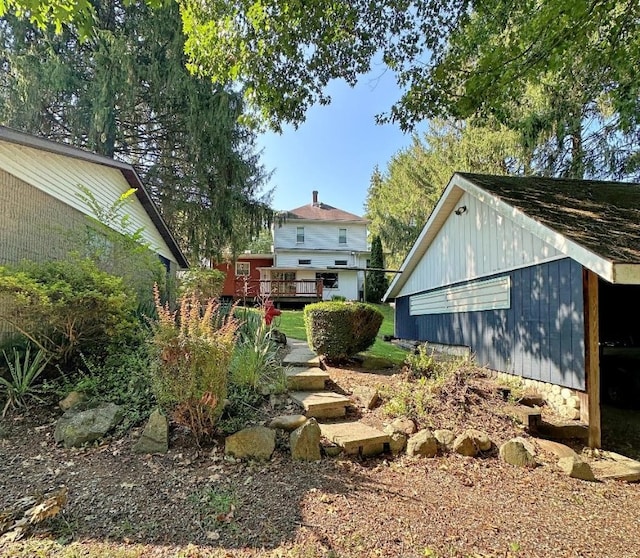 view of yard featuring a wooden deck