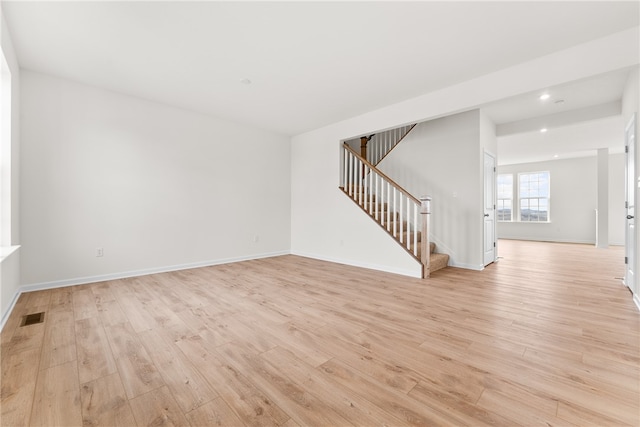 empty room with light wood-type flooring