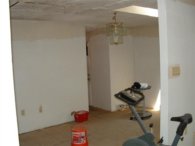 interior space with a textured ceiling