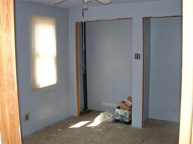 spare room with ceiling fan